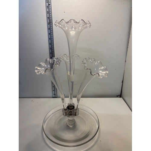 106 - Clear glass epergne with three ruffled edge trumpets set on a round base not postable.