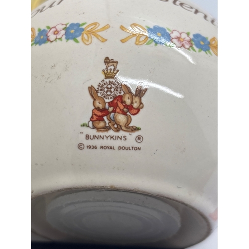 75 - Royal Doulton Bunnykins ceramic coin bank with christening design. Produced in 1936. Features hand-p... 