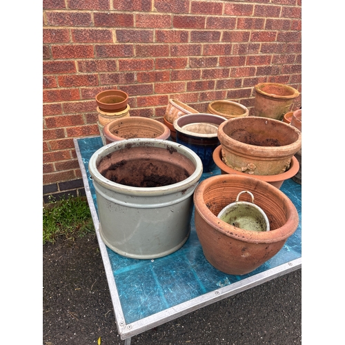1 - Terracotta and ceramic garden pots. Includes various sizes and designs, some with signs of use and w... 