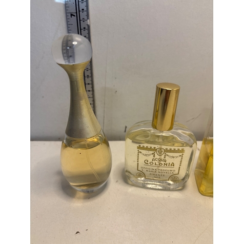 9 - Part used perfumes  Dior, Acqua Colonia, Floris, and Daisy bottles.