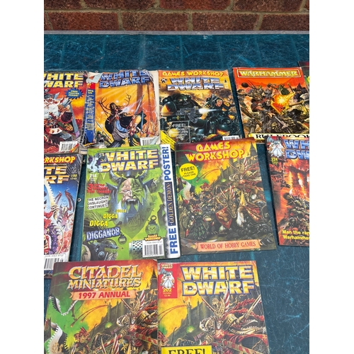 134 - 13 White Dwarf magazines by Games Workshop. Includes various issues with themes on Warhammer and rel... 