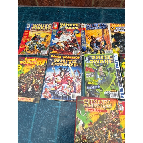 134 - 13 White Dwarf magazines by Games Workshop. Includes various issues with themes on Warhammer and rel... 