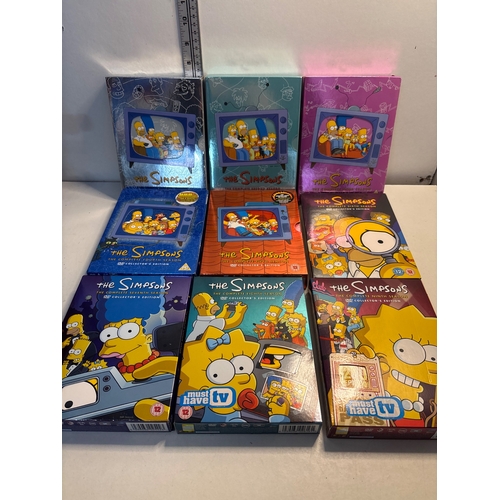 449 - Nine collectors edition DVD box sets of The Simpsons series, series 1-9