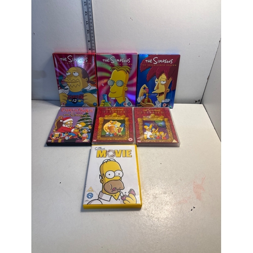 450 - The Simpsons DVDs, including collectors edition seasons, specials, and movie.