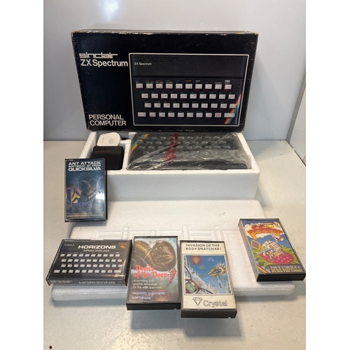 Sinclair ZX Spectrum personal computer with box, cables, and five ...