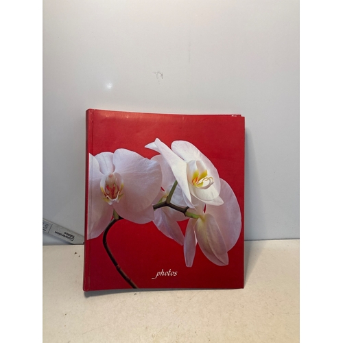 127 - Photo album with orchid design on a red background, hardcover.