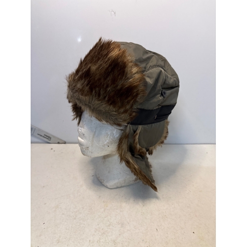 146 - Faux fur-lined trapper hat with exterior nylon fabric.