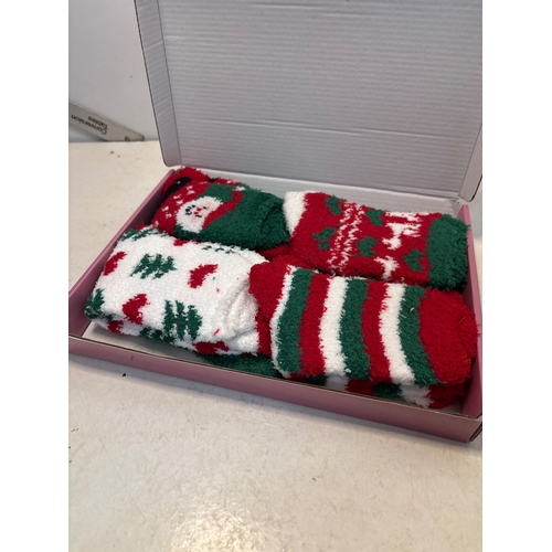 150 - Fluffy holiday-themed socks in original box.