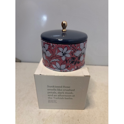 151 - Sunkissed Rose candle with floral-patterned ceramic jar and lid.