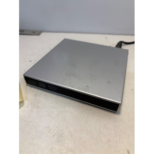 110 - Slim external DVD drive in silver metal casing, USB-powered.