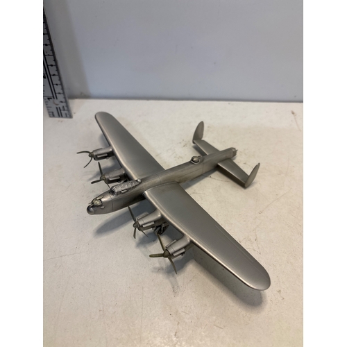 93 - Metal model of an aircraft with four propellers and loop detail.