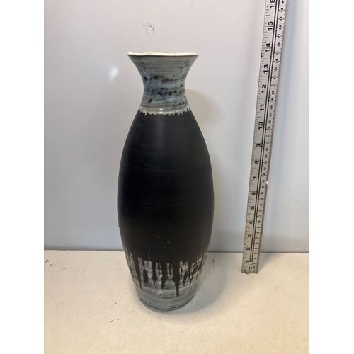 10 - Mid-century ceramic vase with black glaze and white accents, approximately 14 inches tall, in good c... 