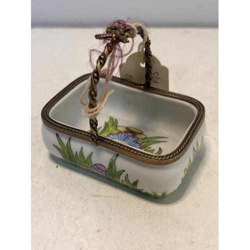 11 - Hand-painted Limoges porcelain box featuring Easter egg motifs, marked 