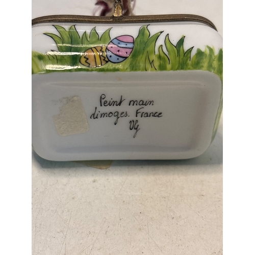 11 - Hand-painted Limoges porcelain box featuring Easter egg motifs, marked 