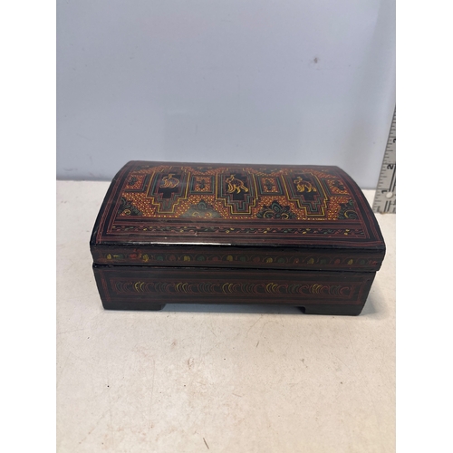 12 - Handcrafted wooden lacquer box with detailed painted exterior and finished black interior. Hinged li... 