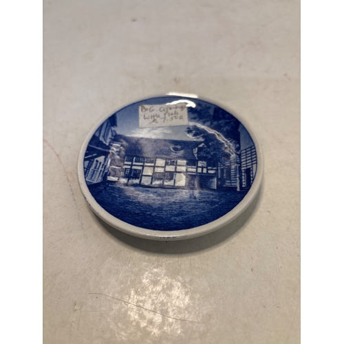 21 - Small ceramic plate from Denmark, marked 'Willemoesgaarden Assens 2010'. Features a blue design on t... 