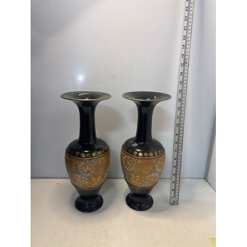 23 - Black ceramic Royal Daltonvases with gilt floral accents, marked No. 536 and 7009 not postable.