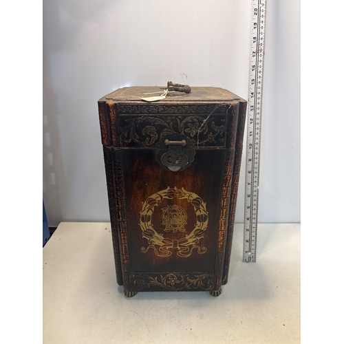 30 - Decorative wooden wine box with lock, ornate design, divided interior.
