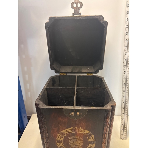30 - Decorative wooden wine box with lock, ornate design, divided interior.
