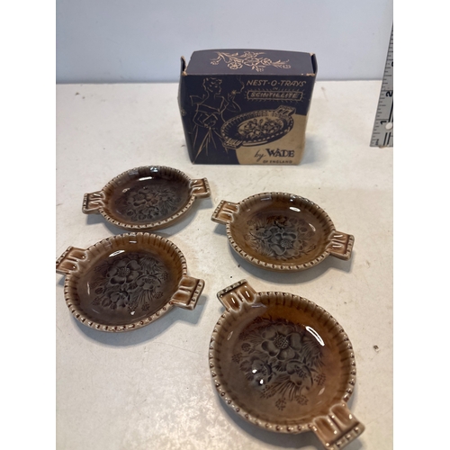 32 - Four Wade Nest-O-Trays in Scintillite design. Made in England.