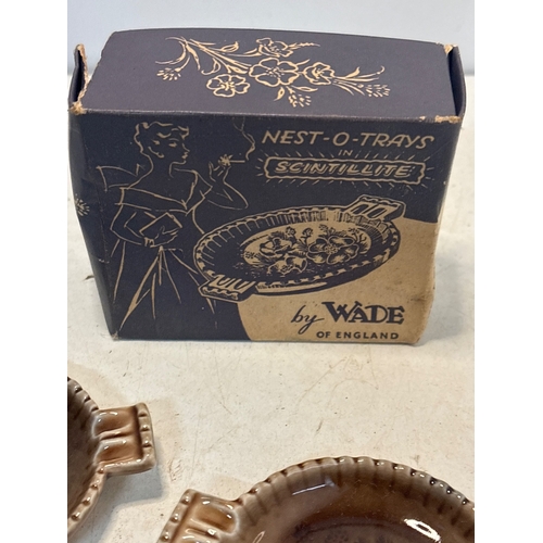 32 - Four Wade Nest-O-Trays in Scintillite design. Made in England.