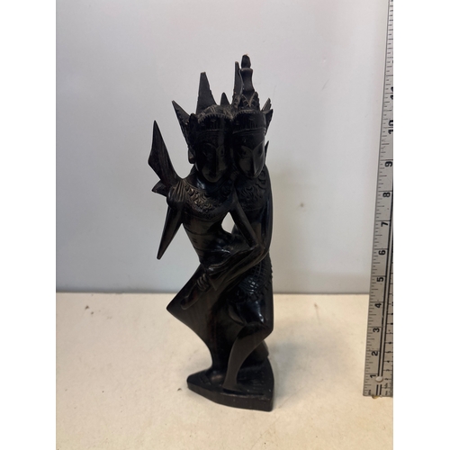 39 - Carved wooden sculpture depicting two Thai figures with intricate detailing, standing approximately ... 