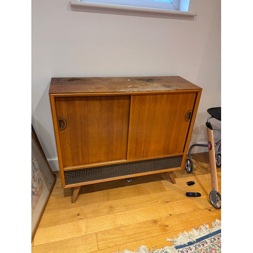 47 - Mid-century wood cabinet with built-in radio and record player.