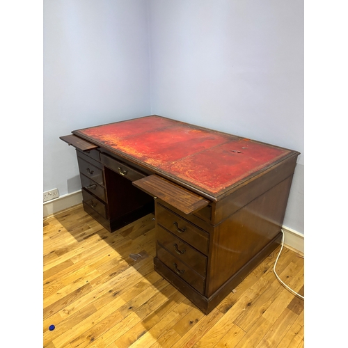 48 - Mahogany partners desk with red leather top and drawers.