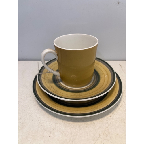 55 - Susie Cooper 'Gay Stripes Old Gold' fine bone china set comprising a cup, saucer, and plate, marked ... 