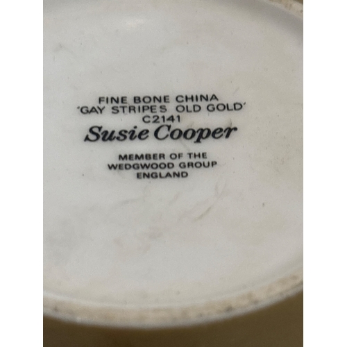 55 - Susie Cooper 'Gay Stripes Old Gold' fine bone china set comprising a cup, saucer, and plate, marked ... 