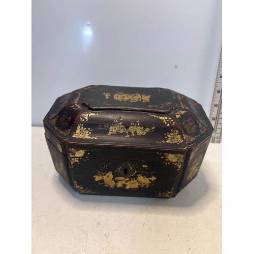 6 - Octagonal lacquered tea caddy with painted gold details, interior metal canisters, and lockable exte... 