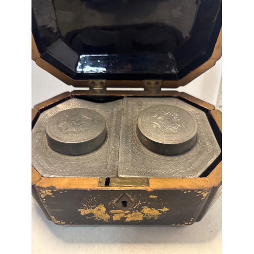 6 - Octagonal lacquered tea caddy with painted gold details, interior metal canisters, and lockable exte... 