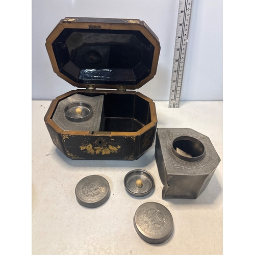 6 - Octagonal lacquered tea caddy with painted gold details, interior metal canisters, and lockable exte... 