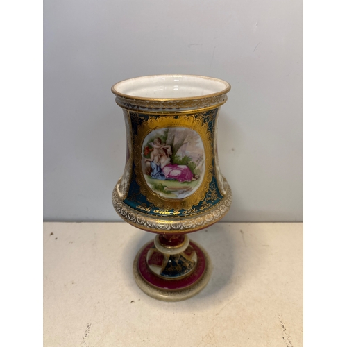 92 - Hand-painted porcelain goblet with intricate gold accents, floral and figurative designs, and a mark... 