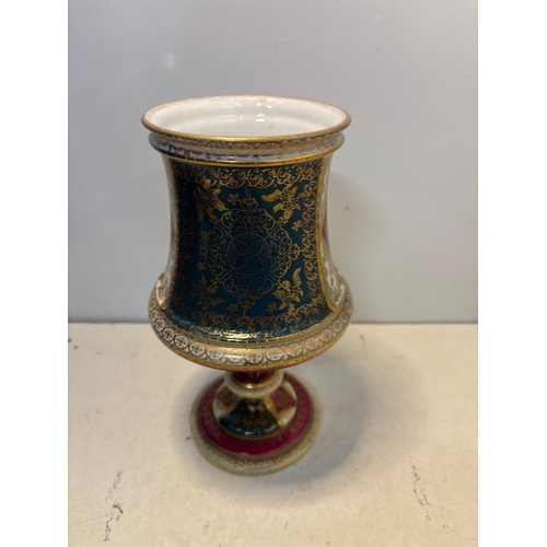 92 - Hand-painted porcelain goblet with intricate gold accents, floral and figurative designs, and a mark... 