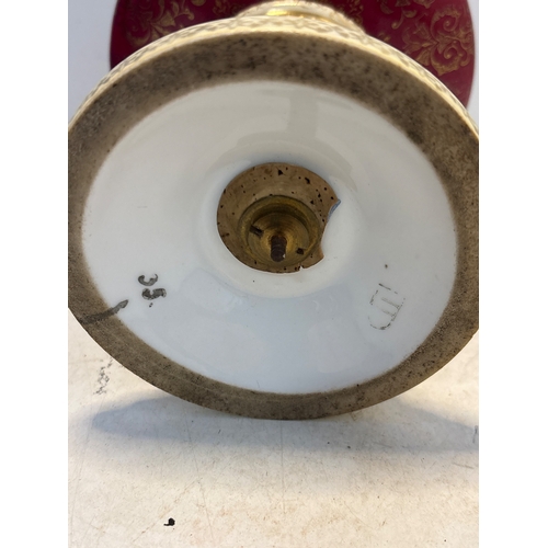 92 - Hand-painted porcelain goblet with intricate gold accents, floral and figurative designs, and a mark... 