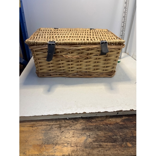 117 - Wicker picnic basket with metal clasps and handles.