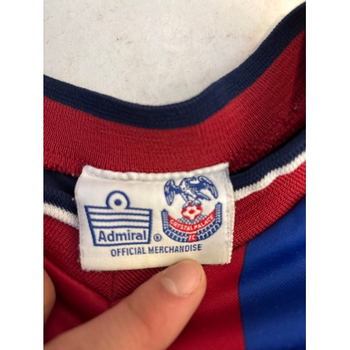133 - Crystal Palace FC jersey by Admiral, red and blue stripes, official merchandise, badge embroidered.