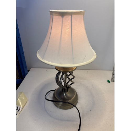 135 - Touch table lamp with a white fabric shade, functional. 3 brightnesses