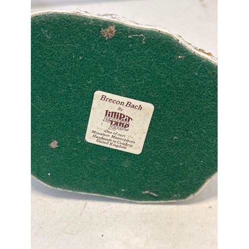 187 - Two Lilliput Lane miniature cottages titled 'Brecon Bach,' handcrafted in the United Kingdom, in goo... 