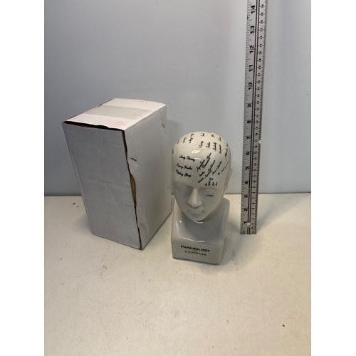 82 - Porcelain phrenology head statue with labeled sections; includes box.