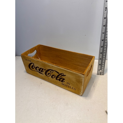 84 - Wooden Coca-Cola box marked 'Drink Coca-Cola in Bottles,' with side handles.