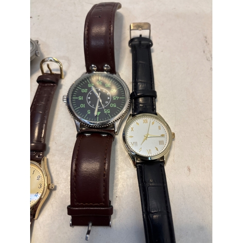 95 - Five assorted wristwatches, including brands such as Armitron and Citizen. Includes various straps a... 
