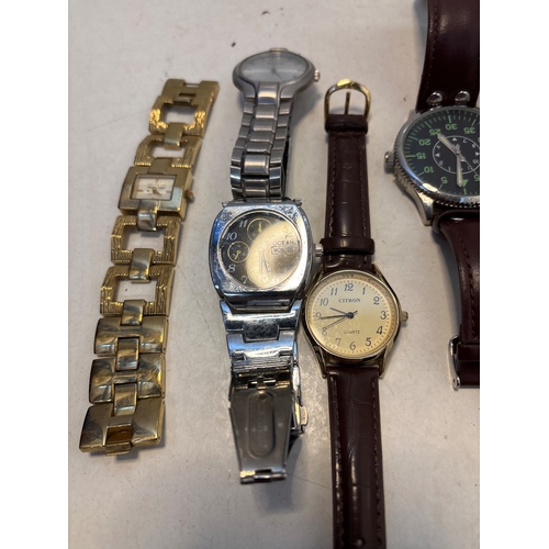 95 - Five assorted wristwatches, including brands such as Armitron and Citizen. Includes various straps a... 
