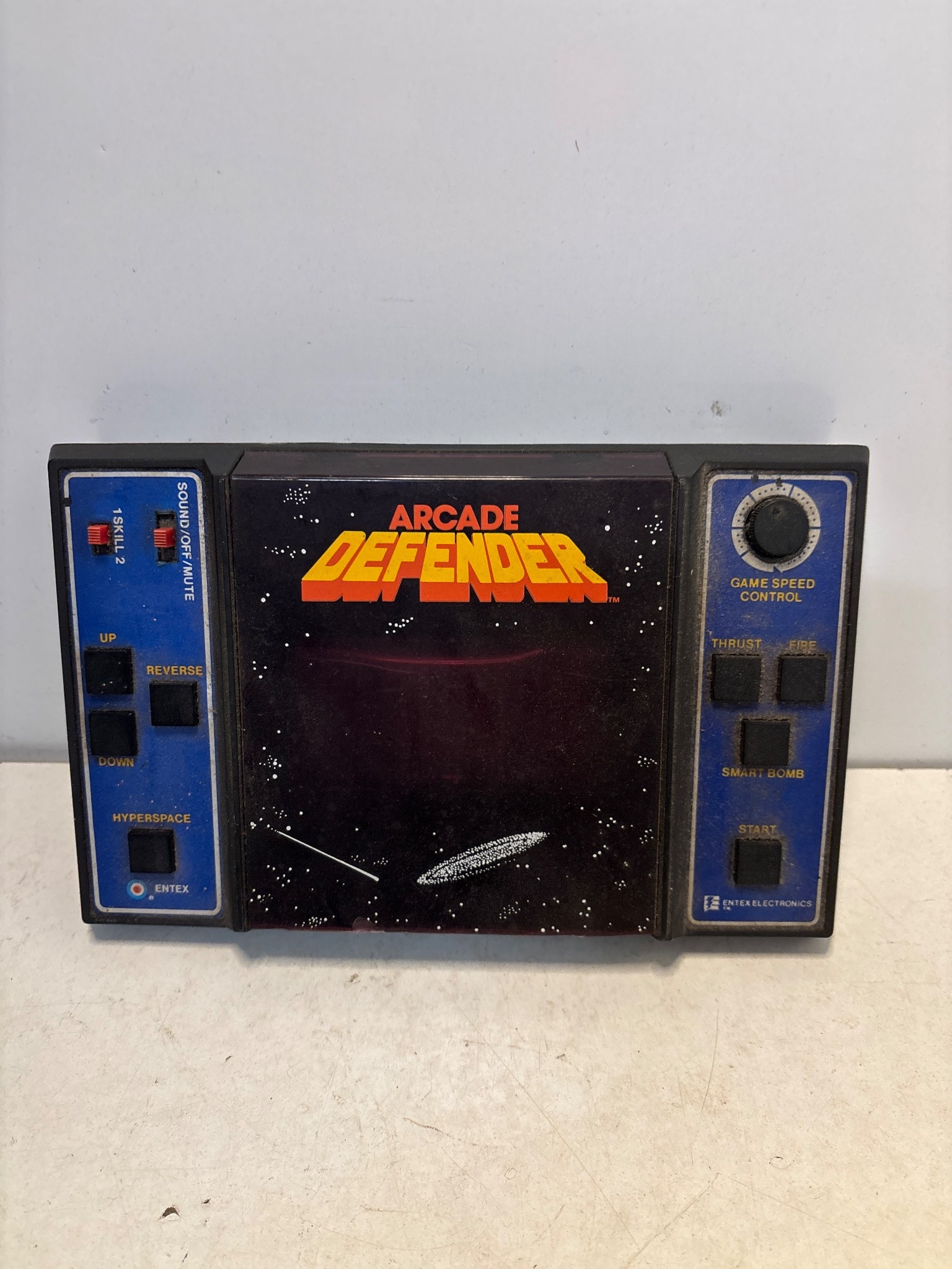 Handheld 'Arcade Defender' electronic game by Entex. Features dual ...