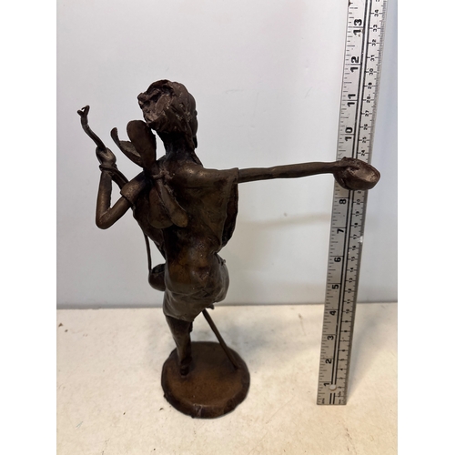 184 - Bronze sculpture of a figure with arm extension and details.