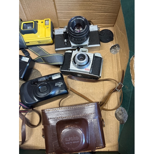 193 - Vintage cameras and accessories including Praktica, Minolta, Vivitar, Ilford leather cases, and more... 