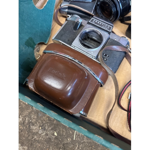 193 - Vintage cameras and accessories including Praktica, Minolta, Vivitar, Ilford leather cases, and more... 