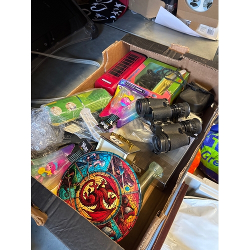 197 - Items including toys, binoculars, and a microscope.