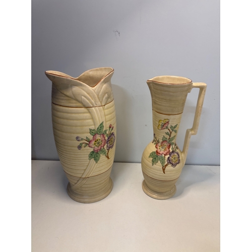 22 - Arthur Wood ceramic vases with floral patterns and distinctive glaze not postable.